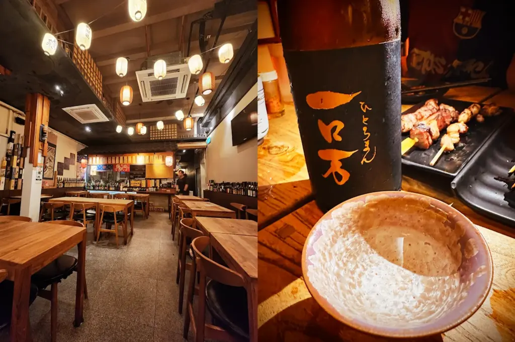 Cozy interior of Shukuu Izakaya & Sake Bar in Singapore, featuring warm pendant lighting, wooden tables, and a close-up of a sake bottle with grilled yakitori skewers.