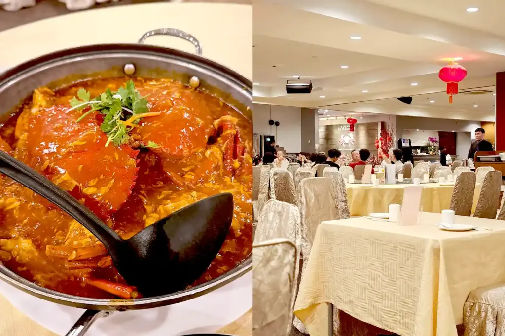 Steaming pot of original chilli crab served in a bustling, lively dining hall filled with round banquet tables at Roland Restaurant.